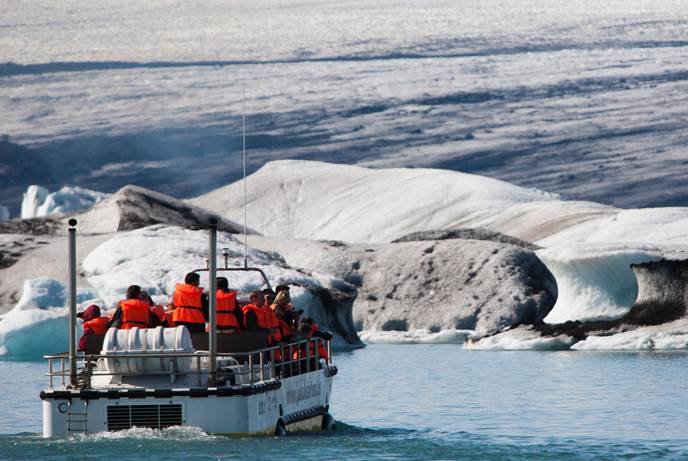 Exploring the icebergs at Jokulsarlon glacier lagoon Iceland