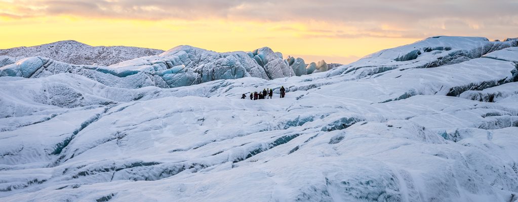 Glacier Hiking Tour From Skaftafell On Svinafellsjokull Glacier In Icelandic Sunset