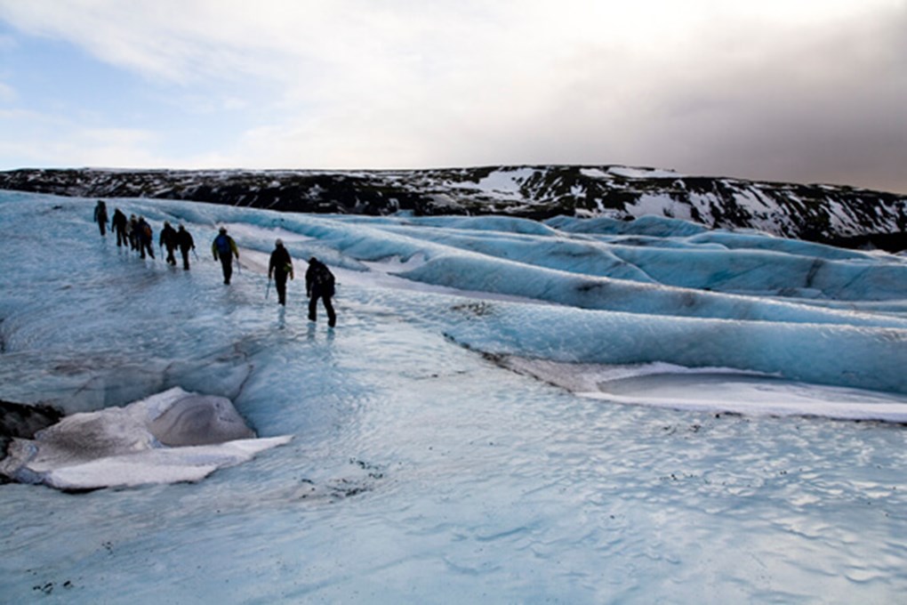 Hiking On A Magnificent Glacier Tongue Near Jokulsarlon In South Iceland