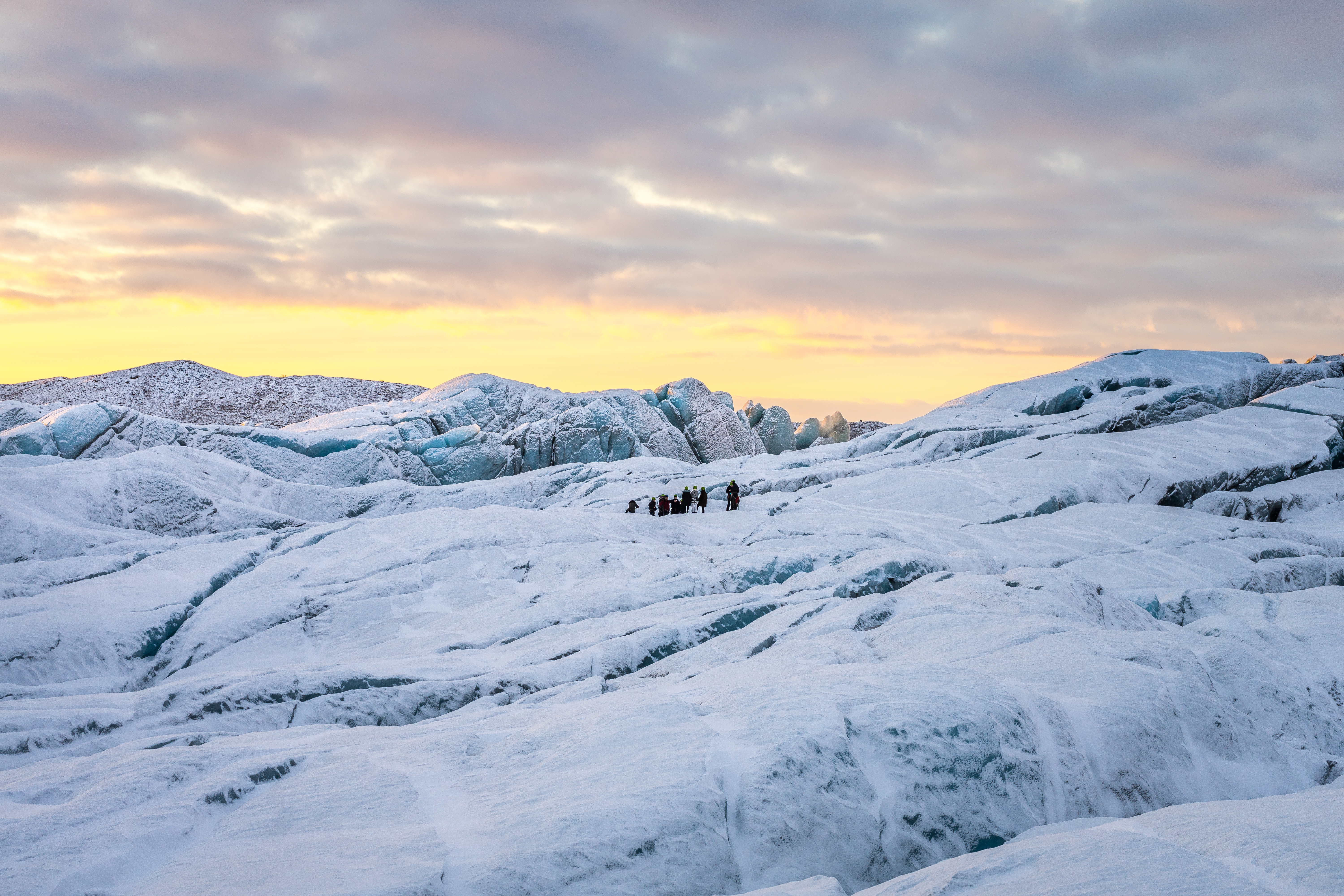 Glacier Hiking Tour From Skaftafell On Svinafellsjokull Glacier In Icelandic Sunset
