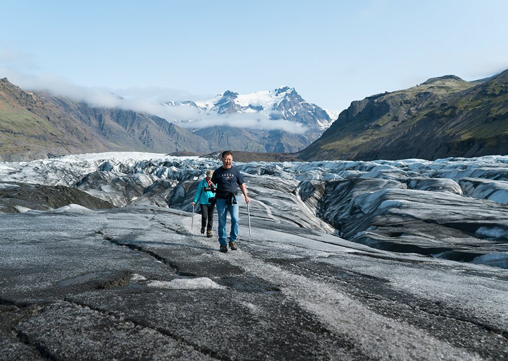 Hiking On Svinafellsjokull Glacier In Summer