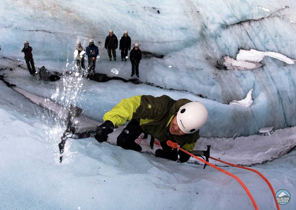 Ice Climbing on Blue Ice of Solheimajokull Glacier, South Iceland Ice Climbing on Blue Ice of Solheimajokull Glacier, South Iceland