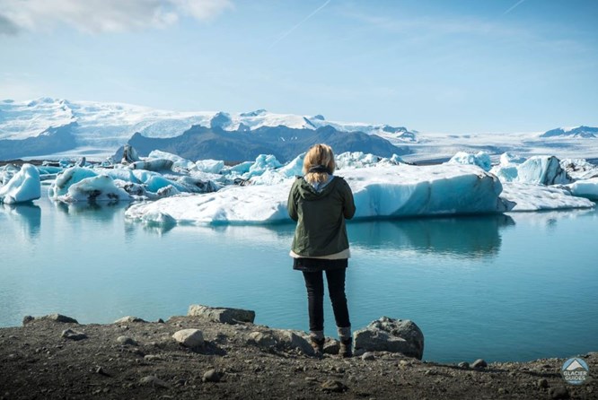 South Coast, Ice Cave, Snæfellsnes & Auroras Girl at Jokulsarlon glacier lagoon