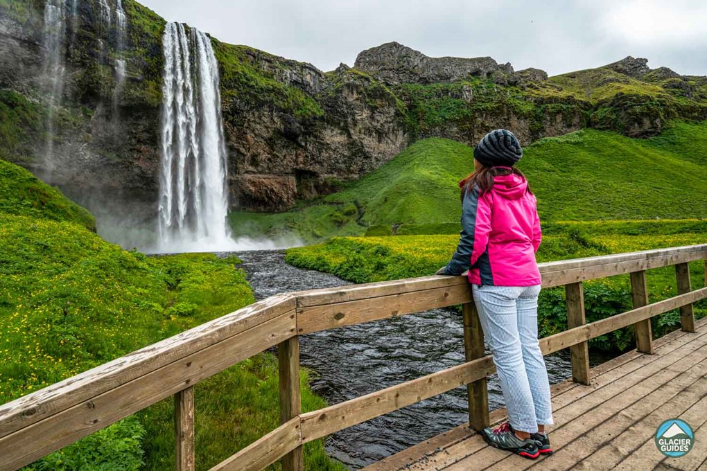 Woman Near Seljalandsfoss Waterfall