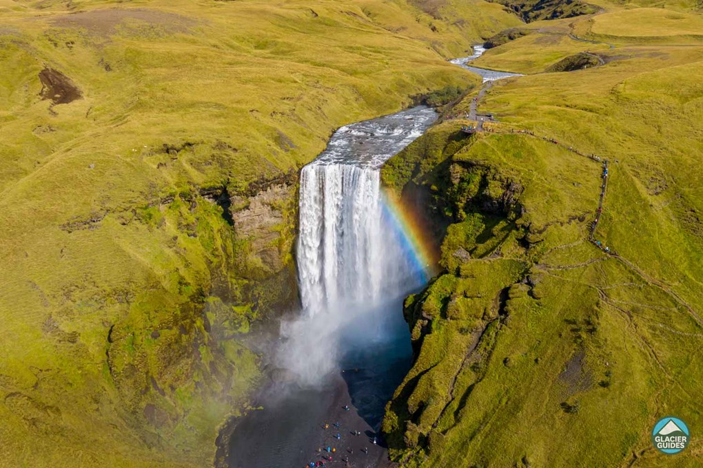 Rainbow And Skogafoss Waterfall From Above