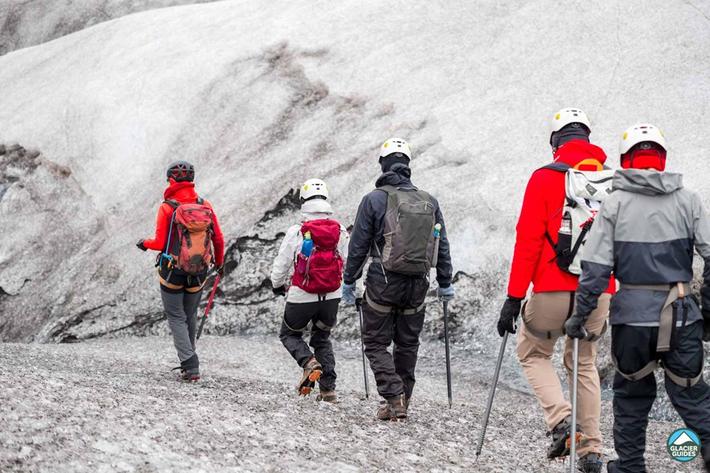 Group of People hiking on Solheimajokull Glacier