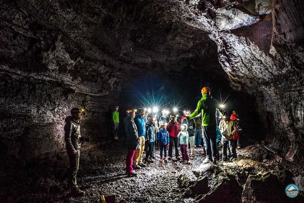 Group of people exploring Víðgelmir Lava cave