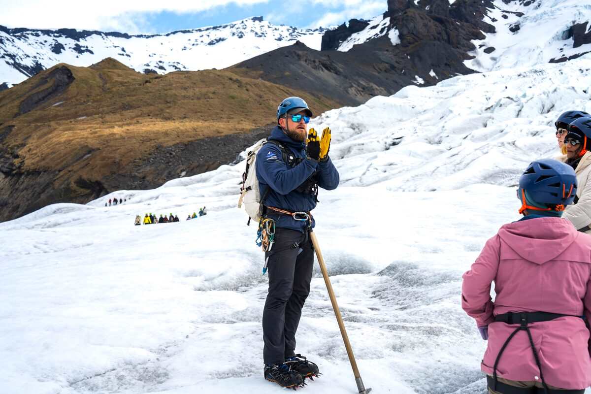 Guide Explaining About Glacier Crevasses On A Glacier in Iceland